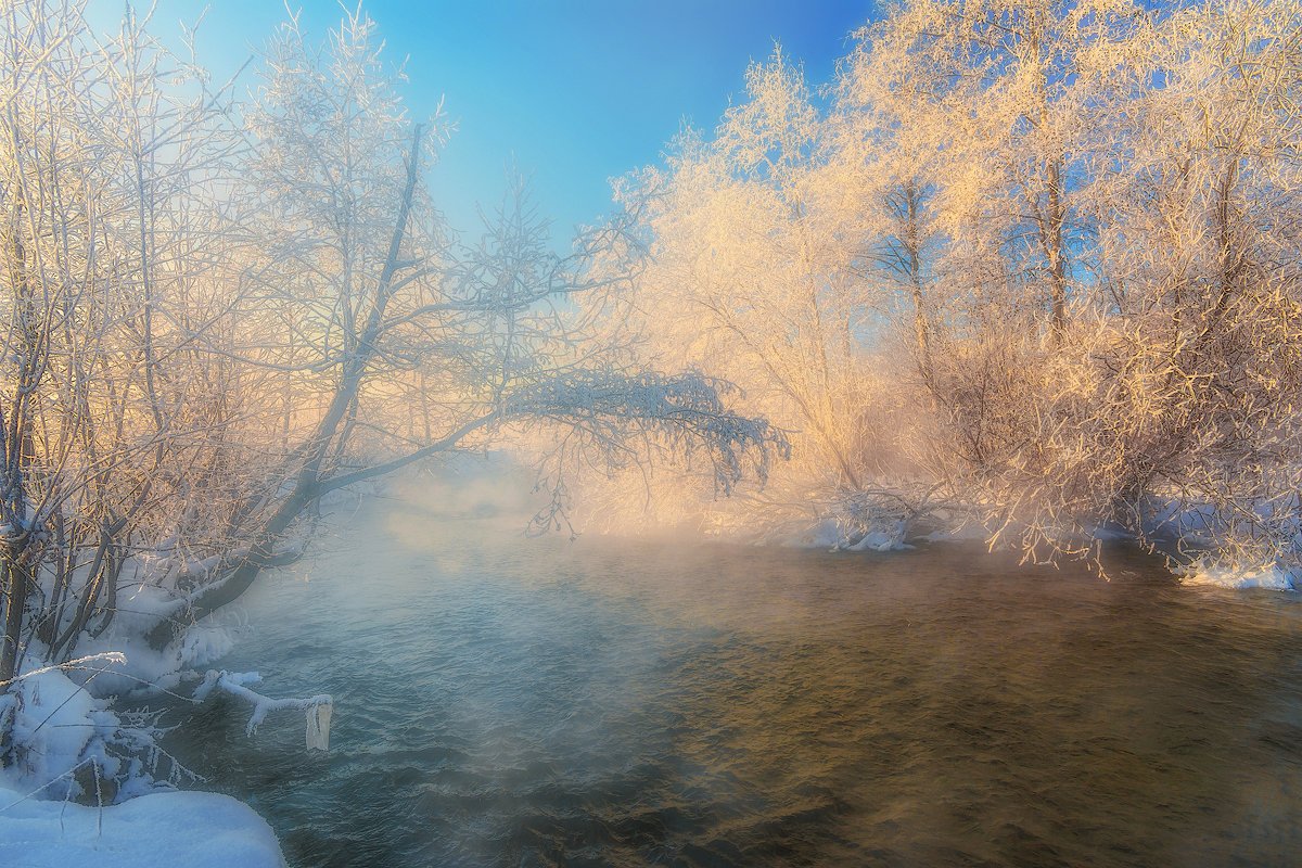 Туман на реке зимой
