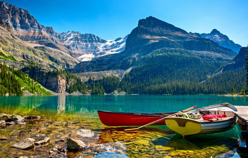 Канада Морейн озеро в горах лодки