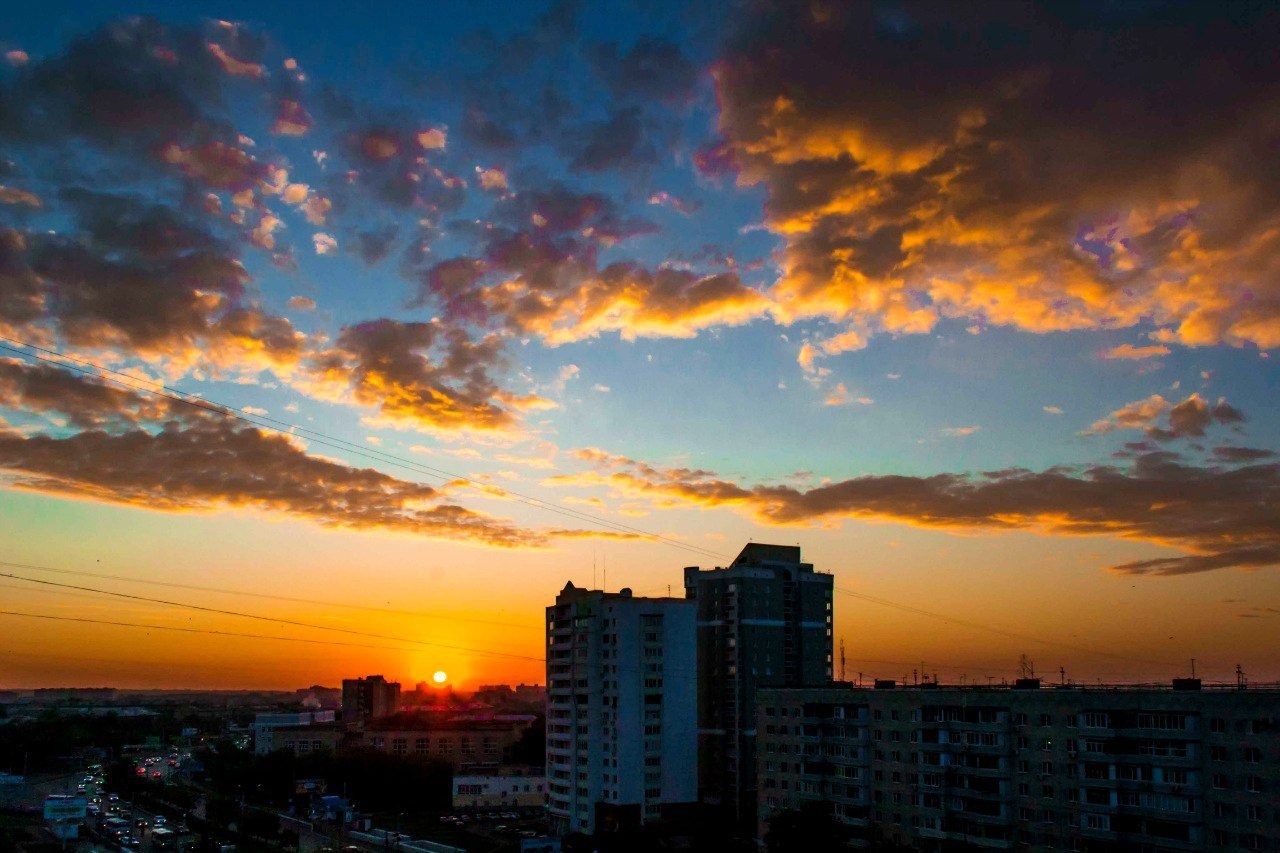 Фото заката города