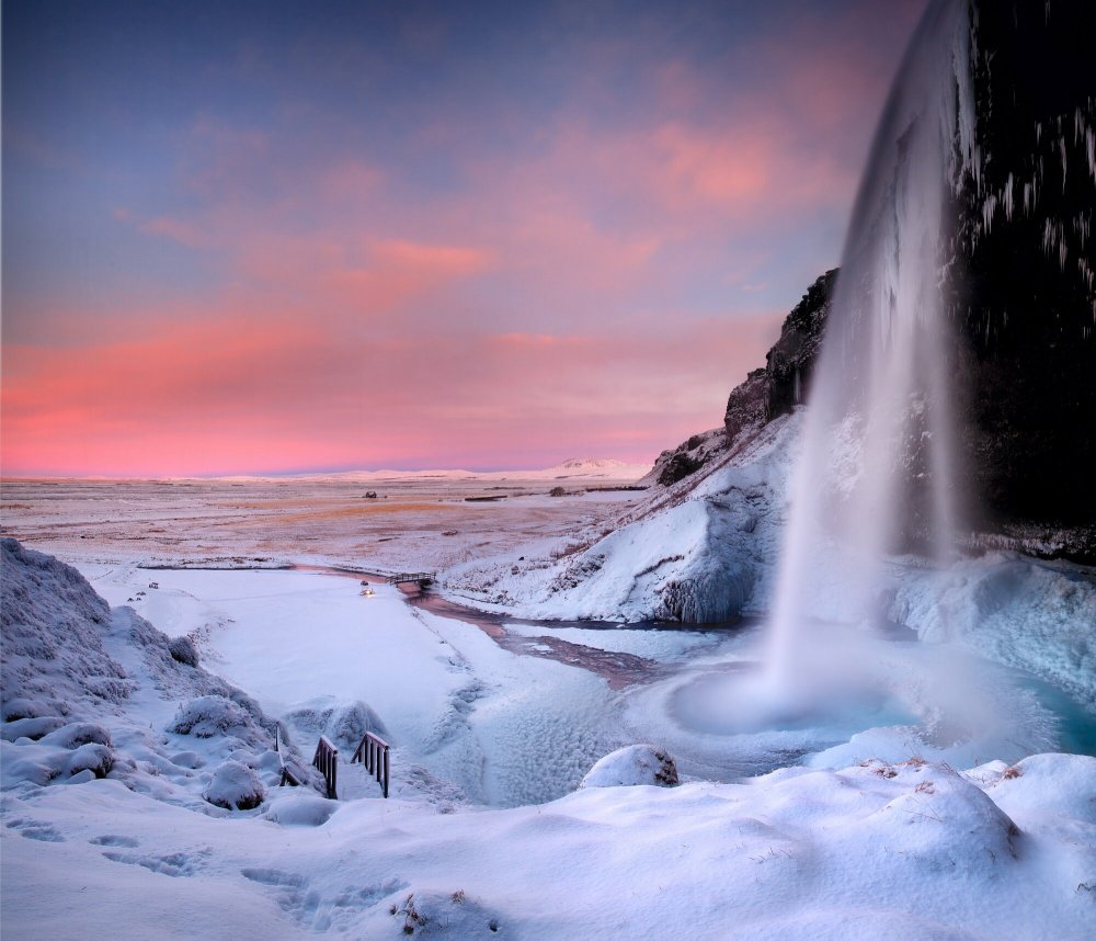 Водопад Сельяландсфосс Исландия зимой