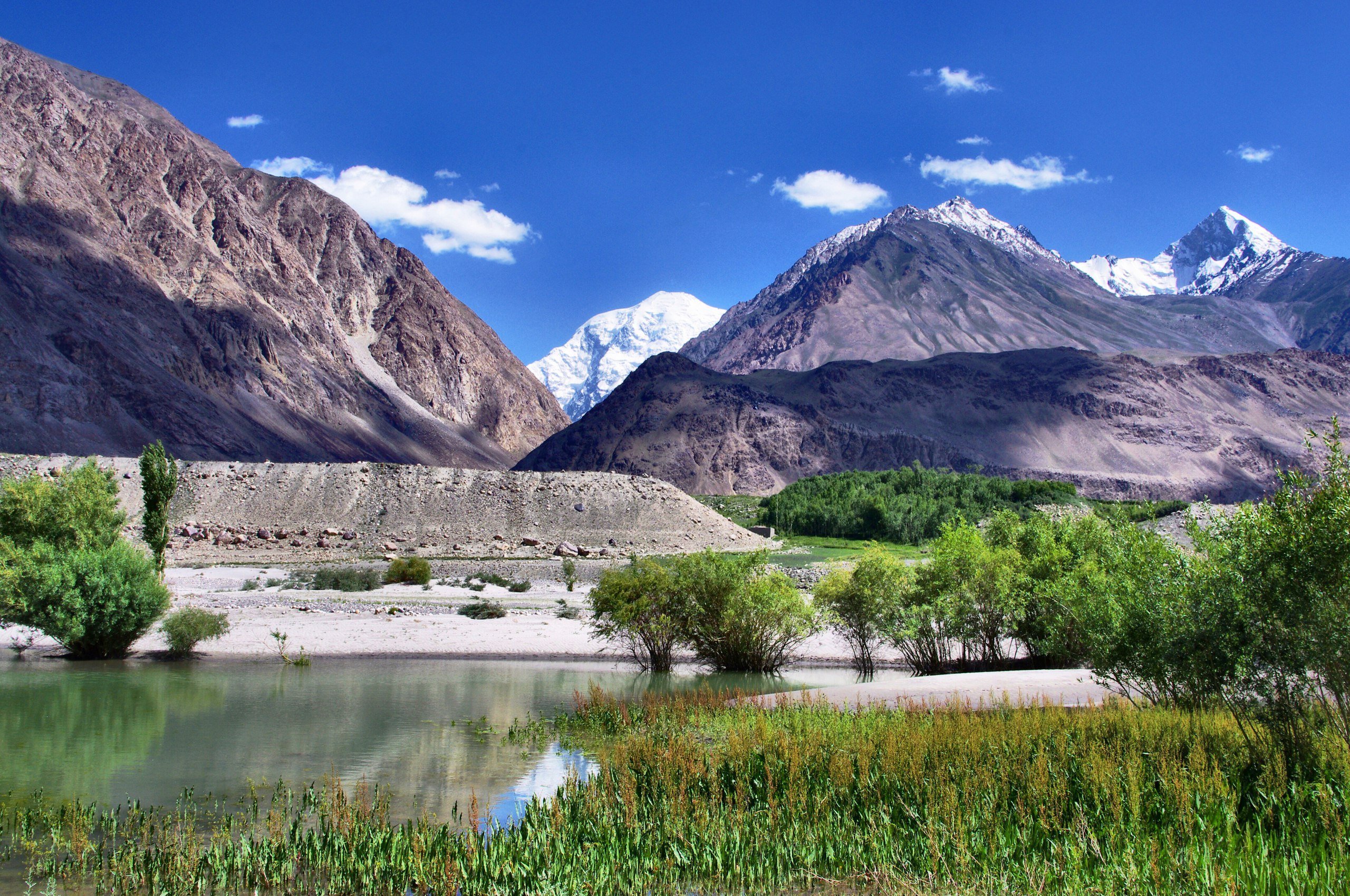 Таджикистан горы. Горы Памира в Таджикистане. Национальный парк Памир Таджикистан. Горный Таджикистан Памир. Душанбе горы Памир.